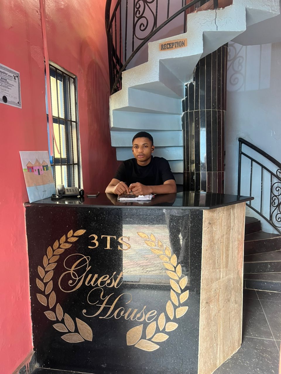 3Ts Guesthouse reception area - warm and welcoming Nigerian hospitality